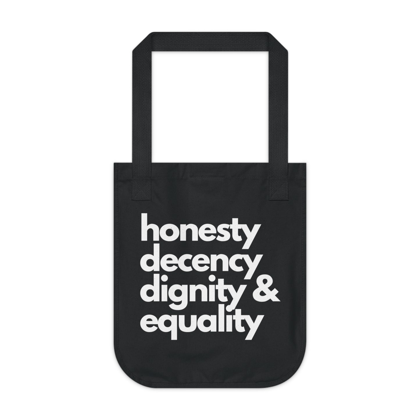 Black tote bag with white text 'honesty decency dignity & equality' on a white background