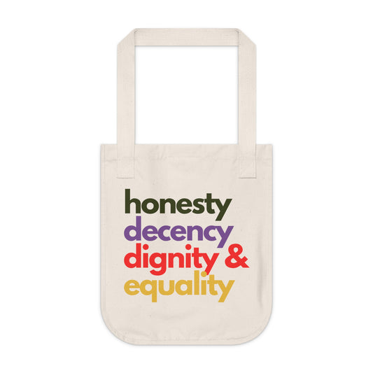 Tote bag with motivational text 'honesty decency dignity & equality' in rainbow colors on a white background